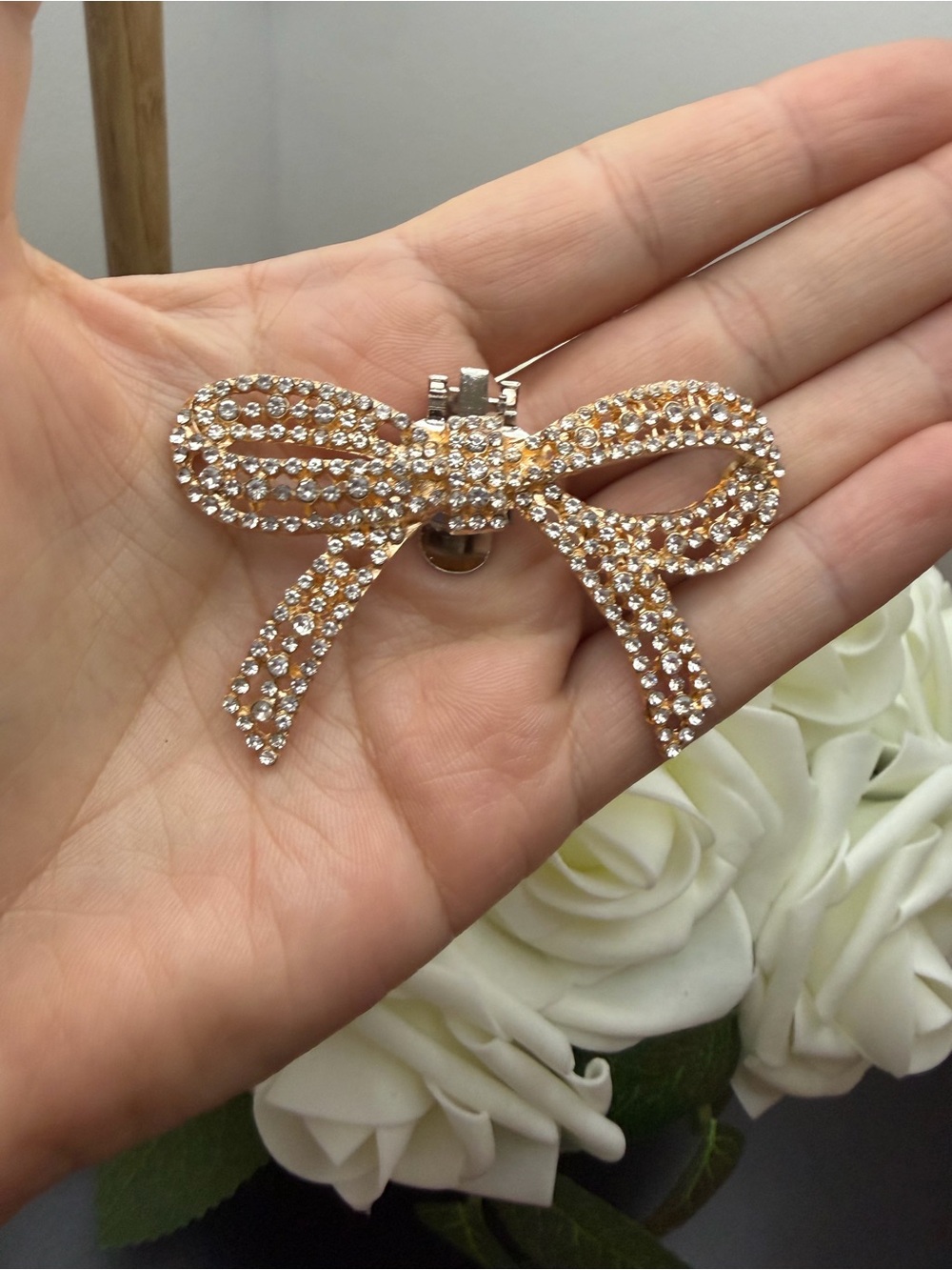 Rhinestone Bow Brooch - Gold Crystal Accent